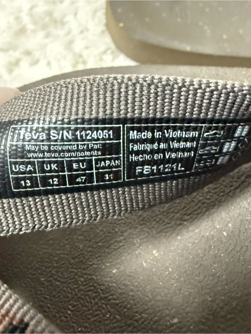 Teva Black Flip-Flops with Gray Patterned Straps